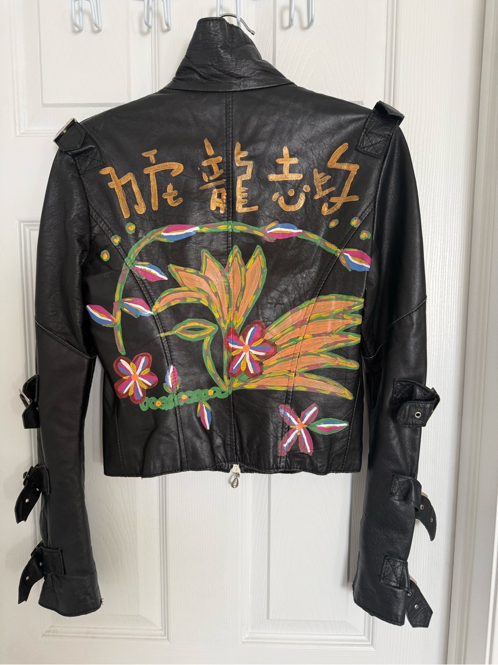 Women's Black Leather Zip-Front Jacket with Buckle Details